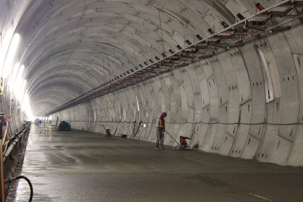 Tunnel that could be constructed with self healing concrete, designed to autonomously repair cracks, preventing water infiltration and reducing maintenance needs.